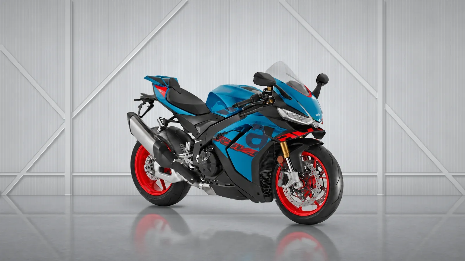 Aprilia RSV4 superbike in blue with red wheels.