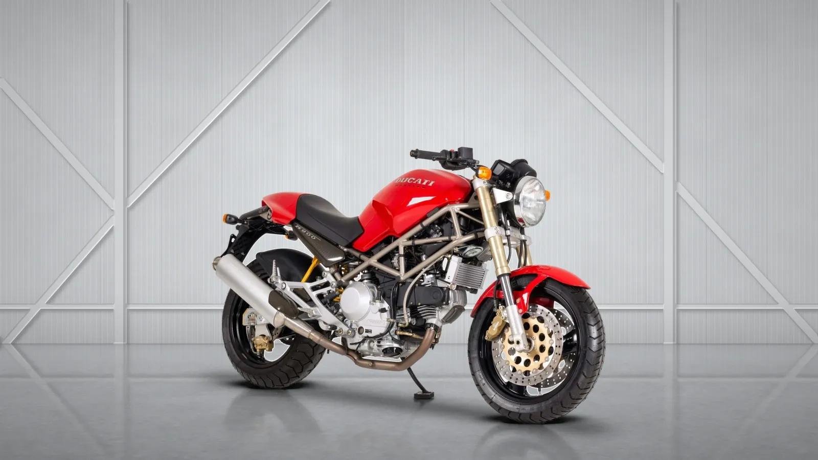 First-generation Ducati Monster 900 naked motorcycle.